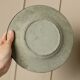 Black ceramic plate with beige geometric relief - 1970s Italian mid-century design
