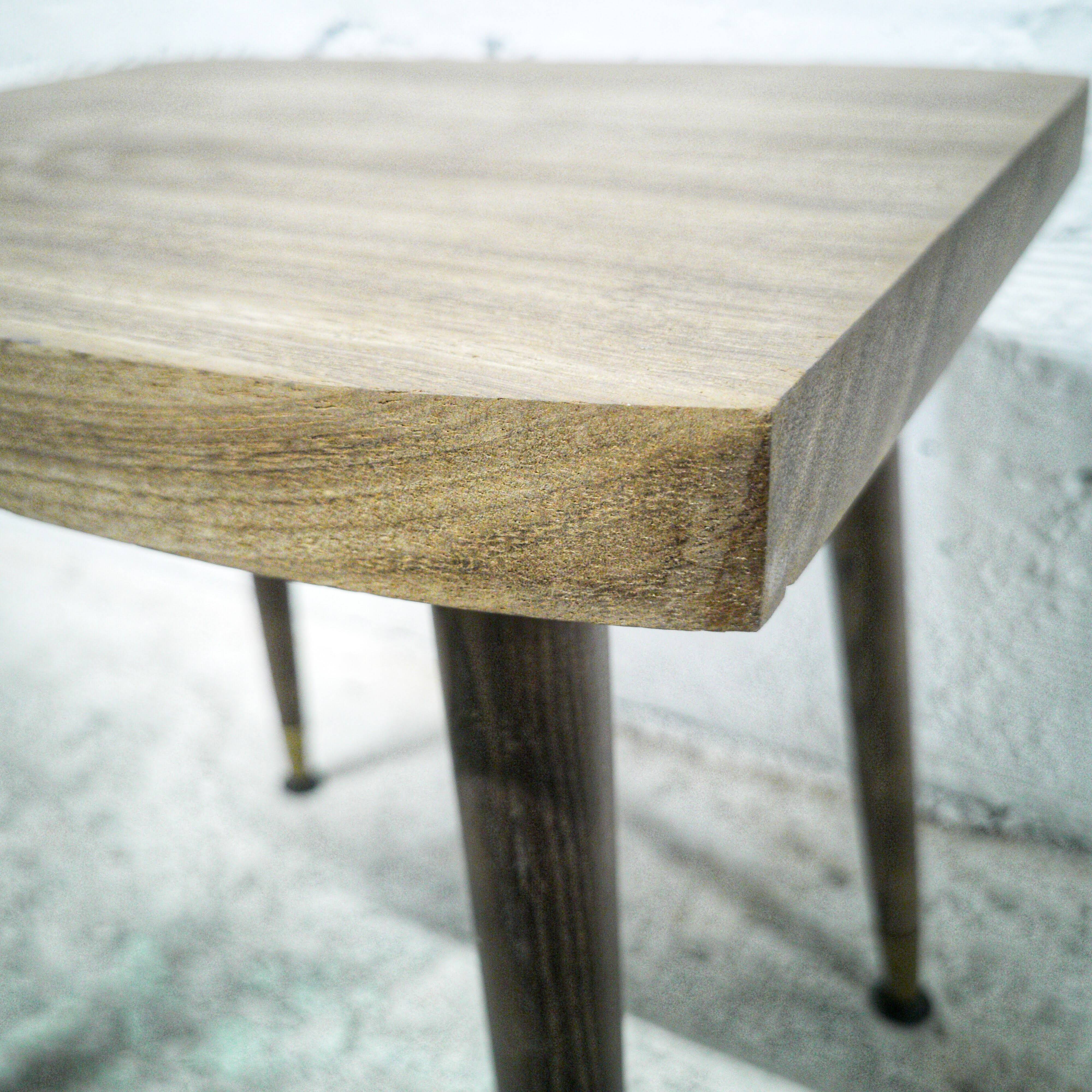 Side table with compass legs