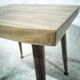 Side table with compass legs