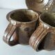 Set of three cups and saucers in pyrite stoneware - Charles Gaudry, Puisaye