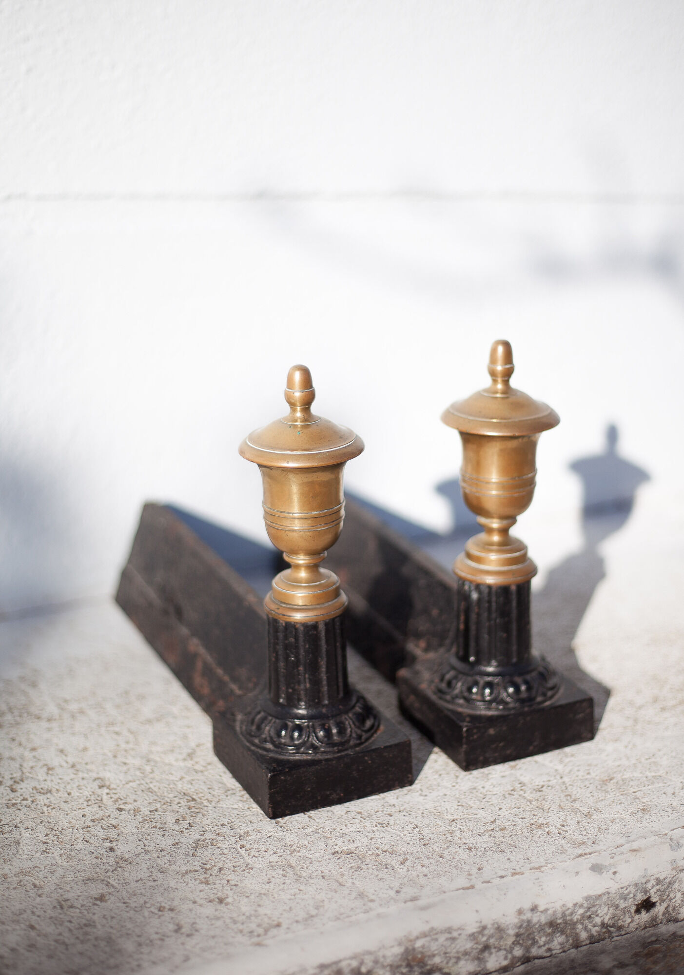 Cast iron and brass chenets
