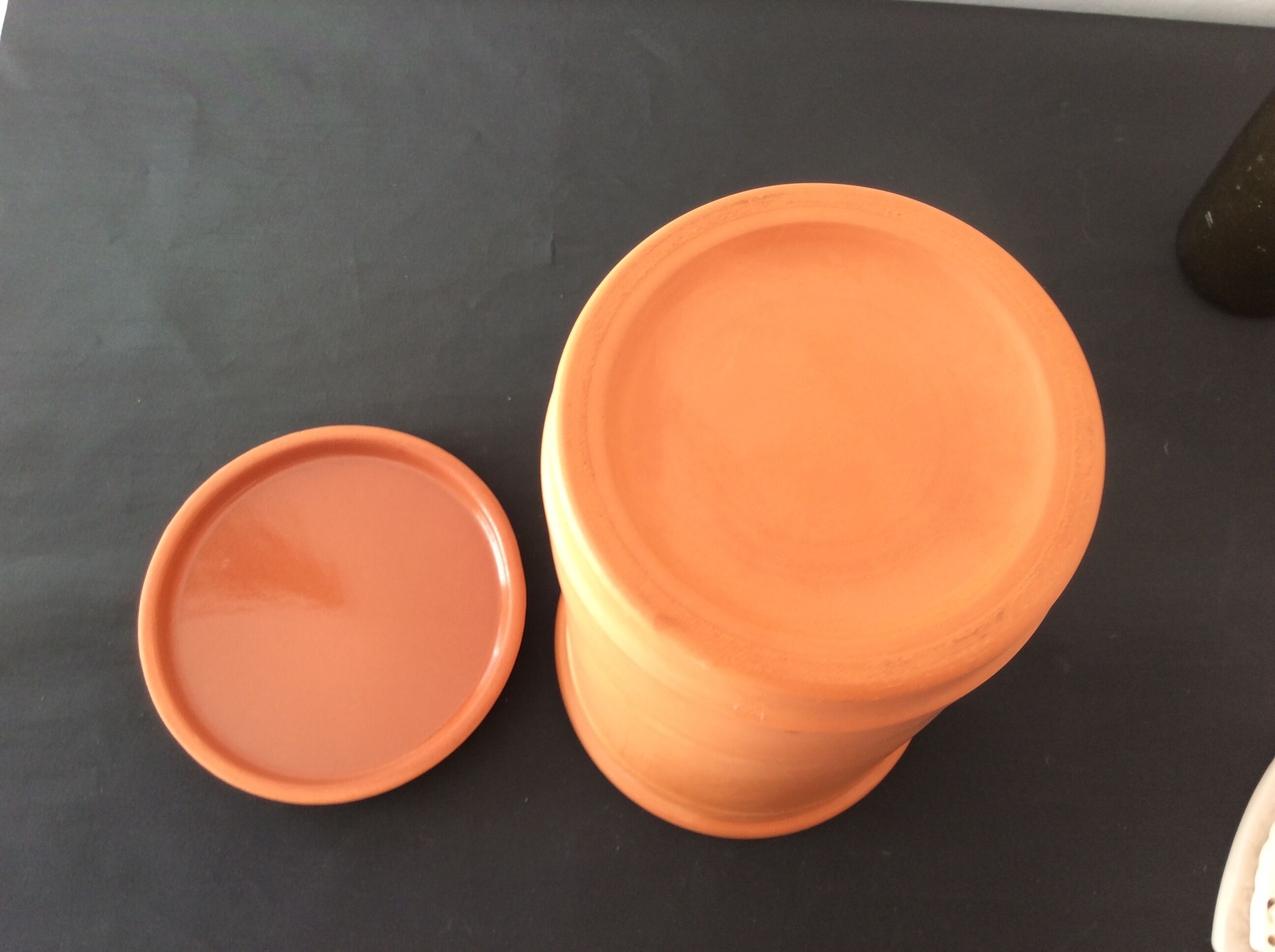 Wine cooler with terracotta saucer