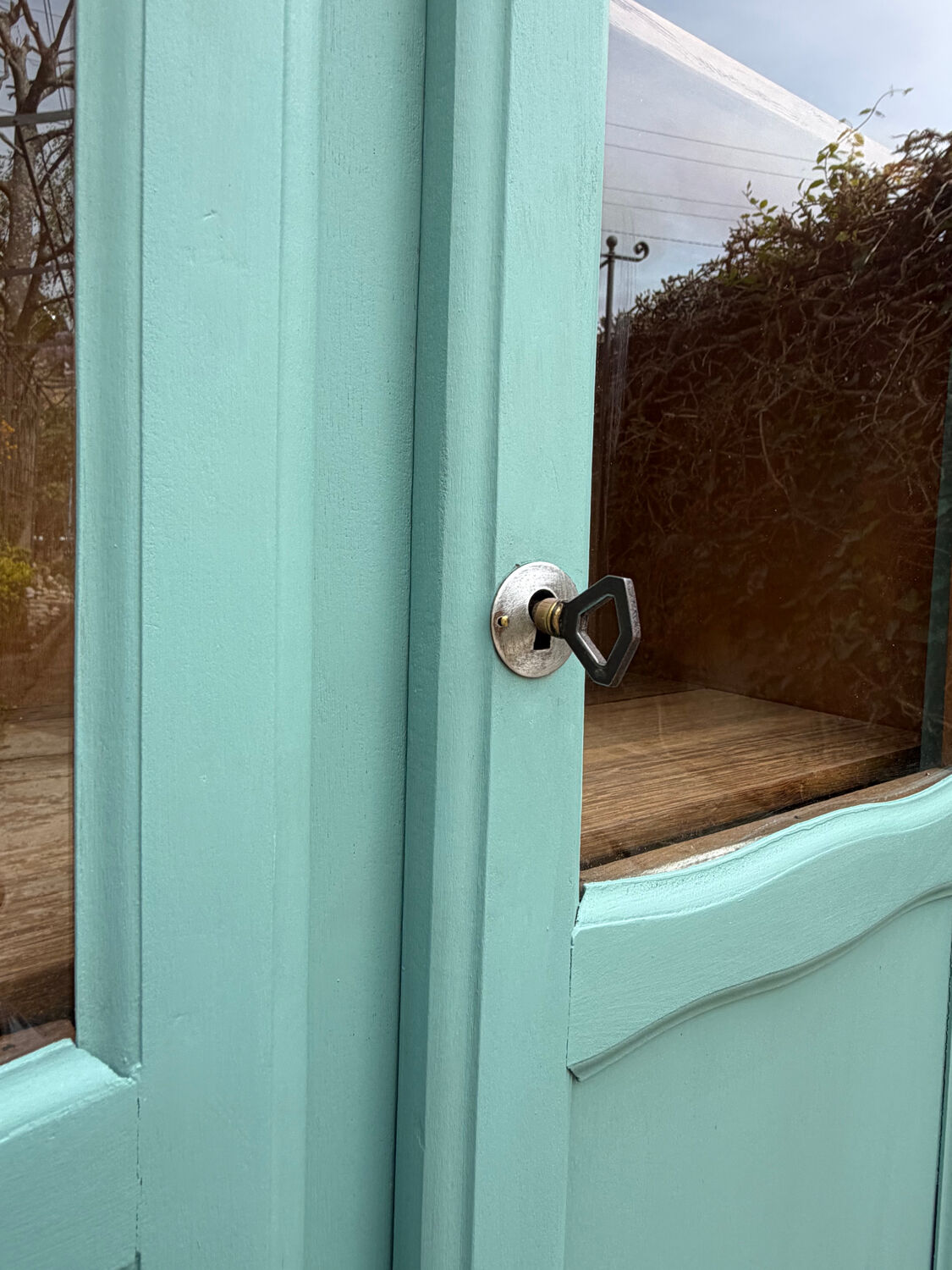 Vintage grey-green glass cabinet from the 1960s.