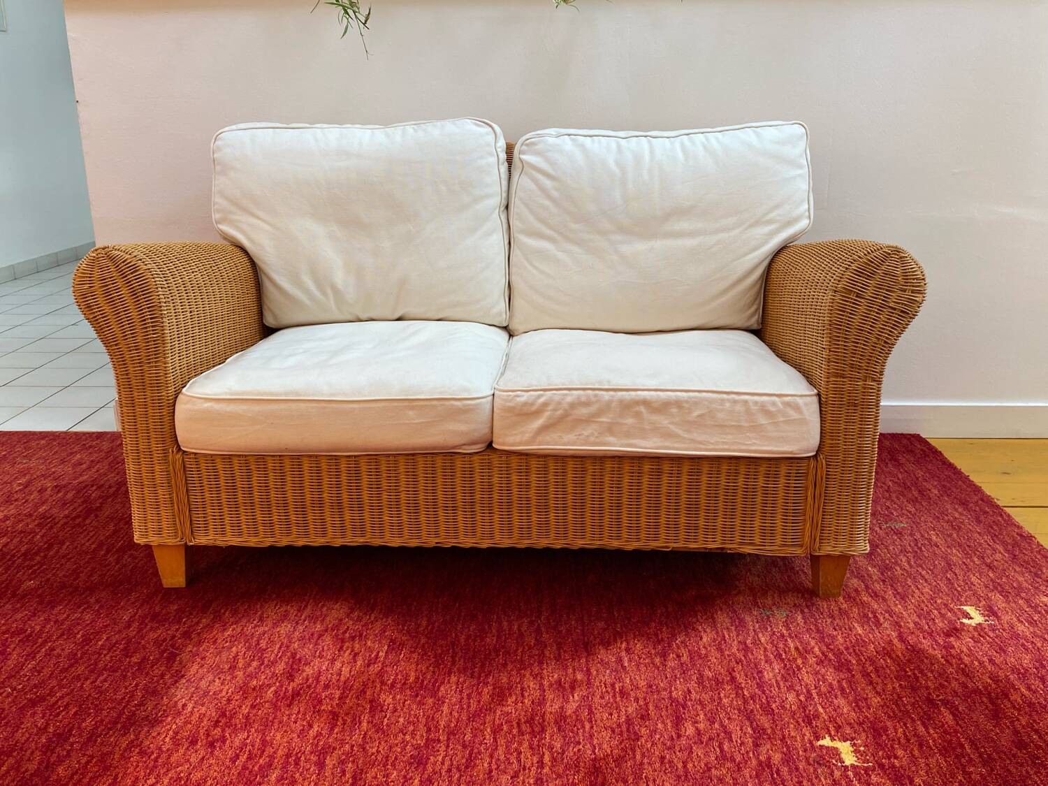 Antique 2-seater rattan sofa from the 70s
