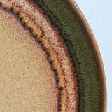 Six vintage stoneware plates with green net