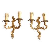 Pair of Louis XV style bronze wall lights