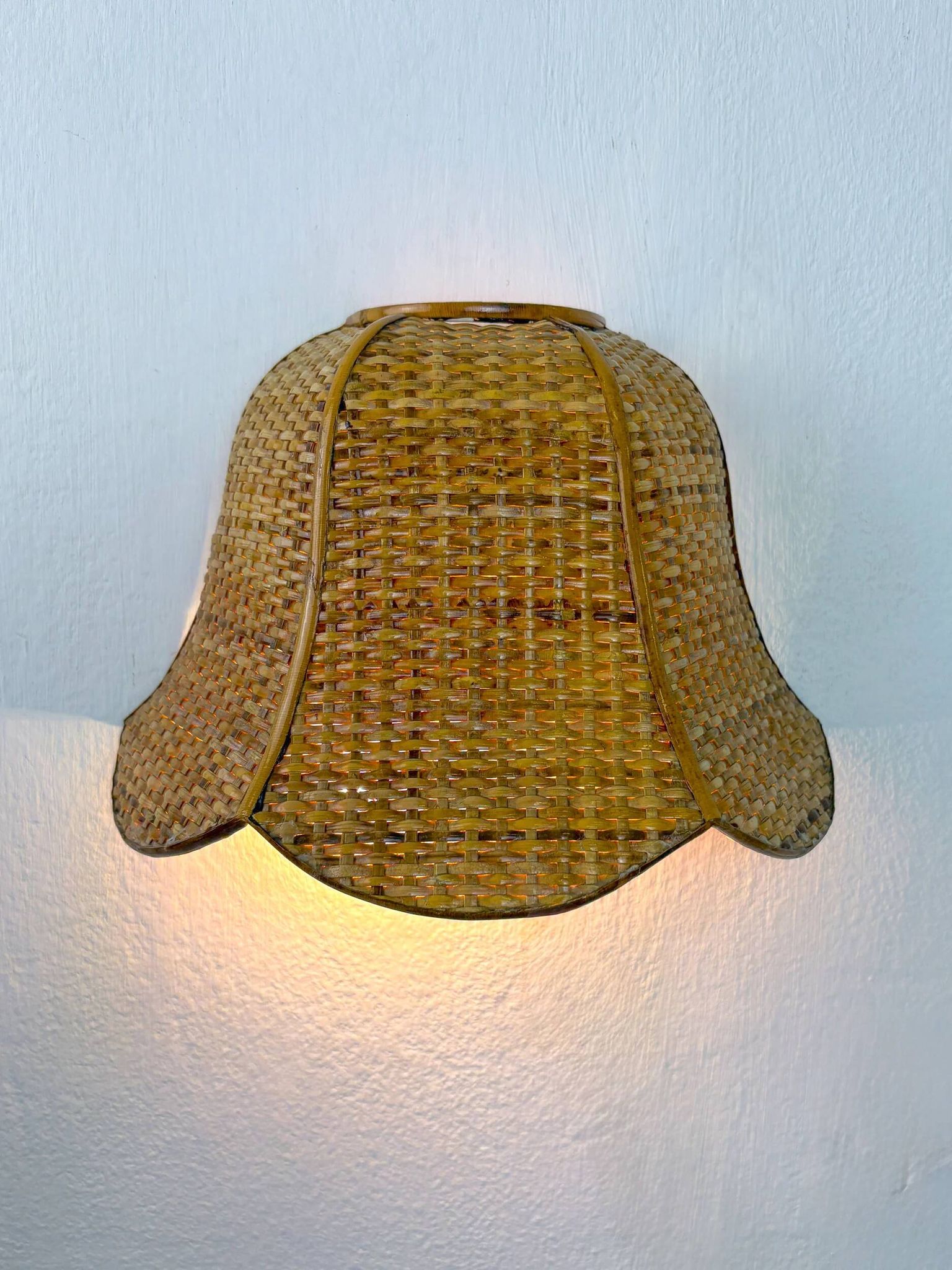 Pair of vintage woven rattan wall shades, Italy 1970s