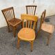 Set of 4 yellow mismatched bistro chairs