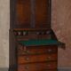 George III oak secretary bookcase circa 1760, Thomas Chippendale style.