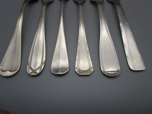 6 antique silver metal forks mismatched for a chic table