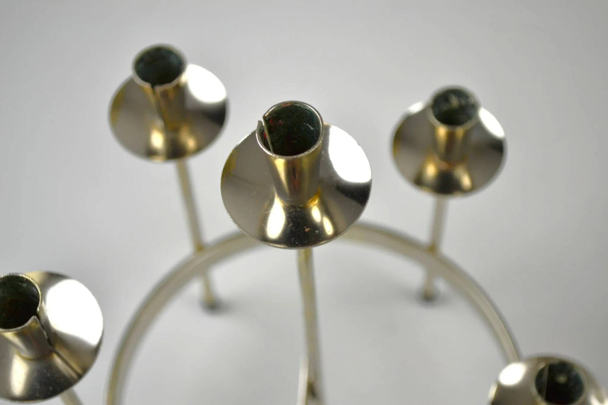 Pair of white metal candle holders "Spiral" by Gunnar Ander for Ystad-Metall, Sweden, 1960s.