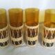 Amber glass and wicker glasses