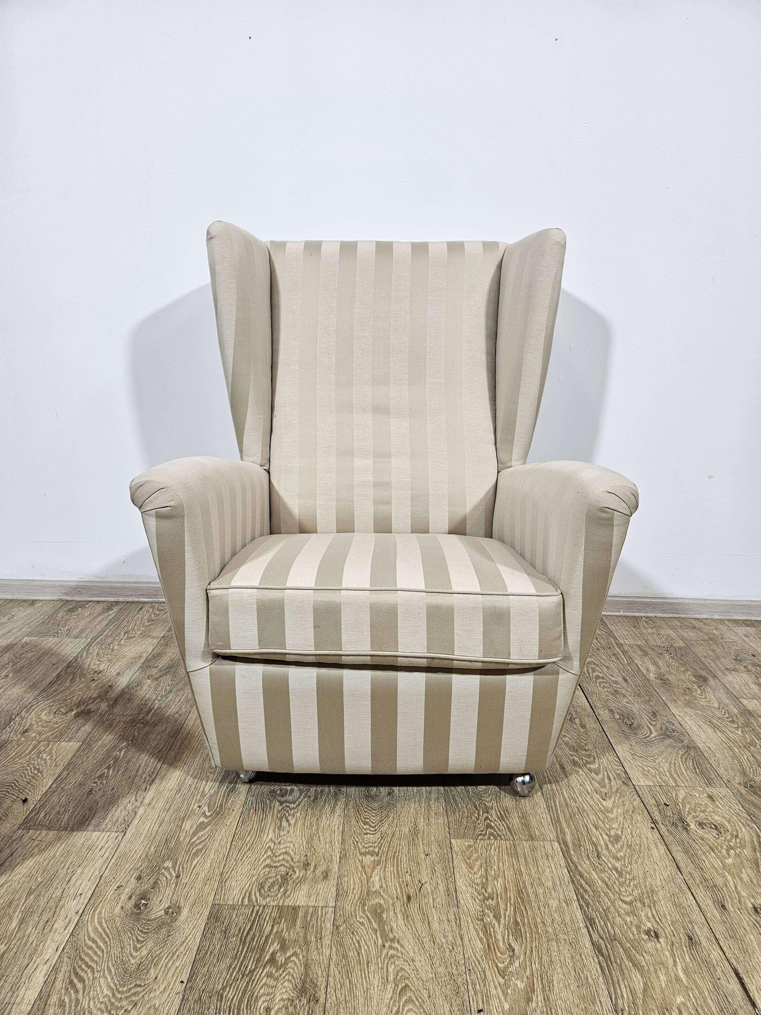 Winged armchair with footstool, 1960s.