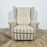 Winged armchair with footstool, 1960s.
