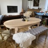 Oval table with integrated extension