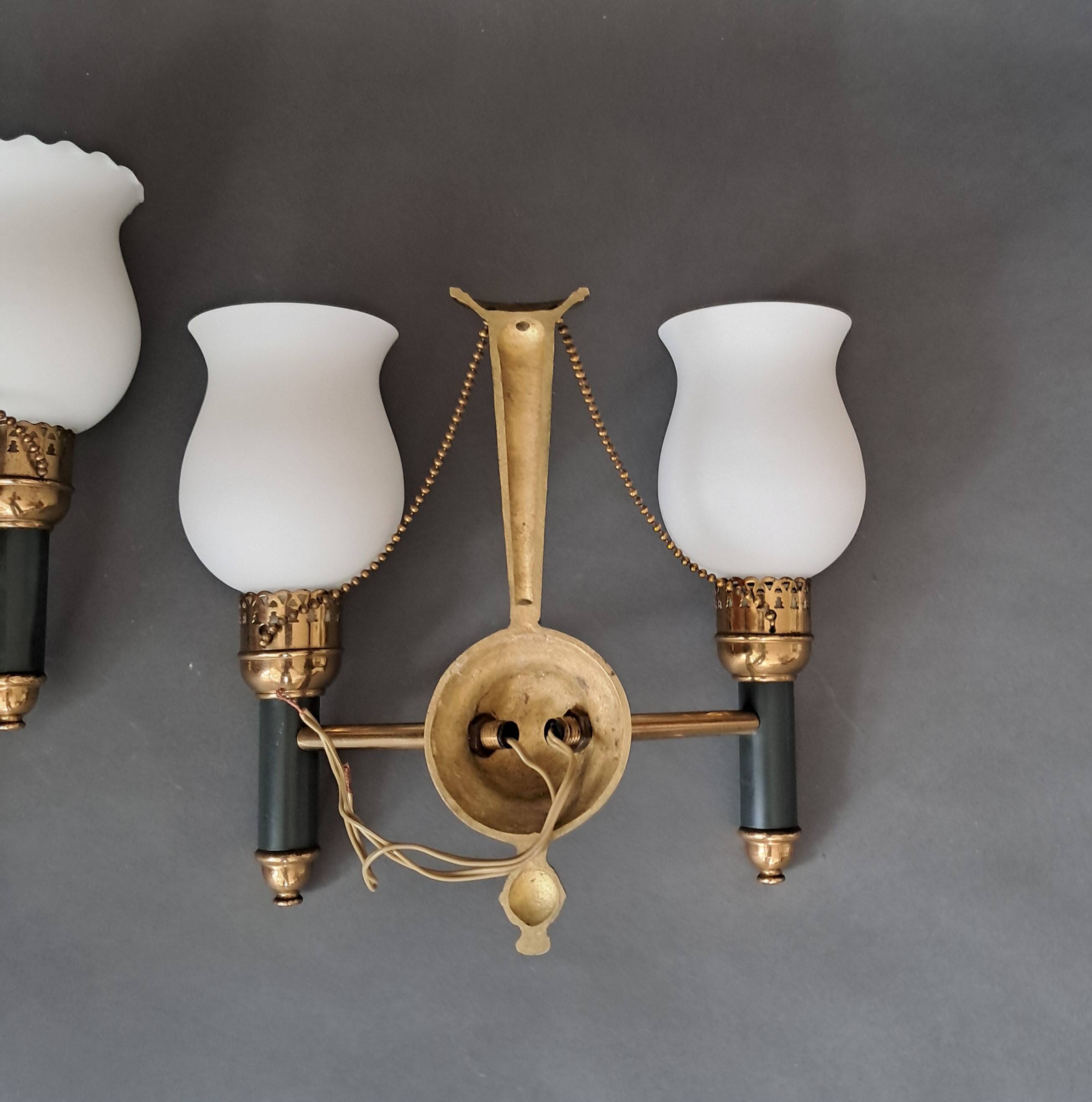 Pair of two-light sconces from Maison Lunel 1960.