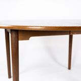 Dining table in dark oak of danish design from the 1960s.