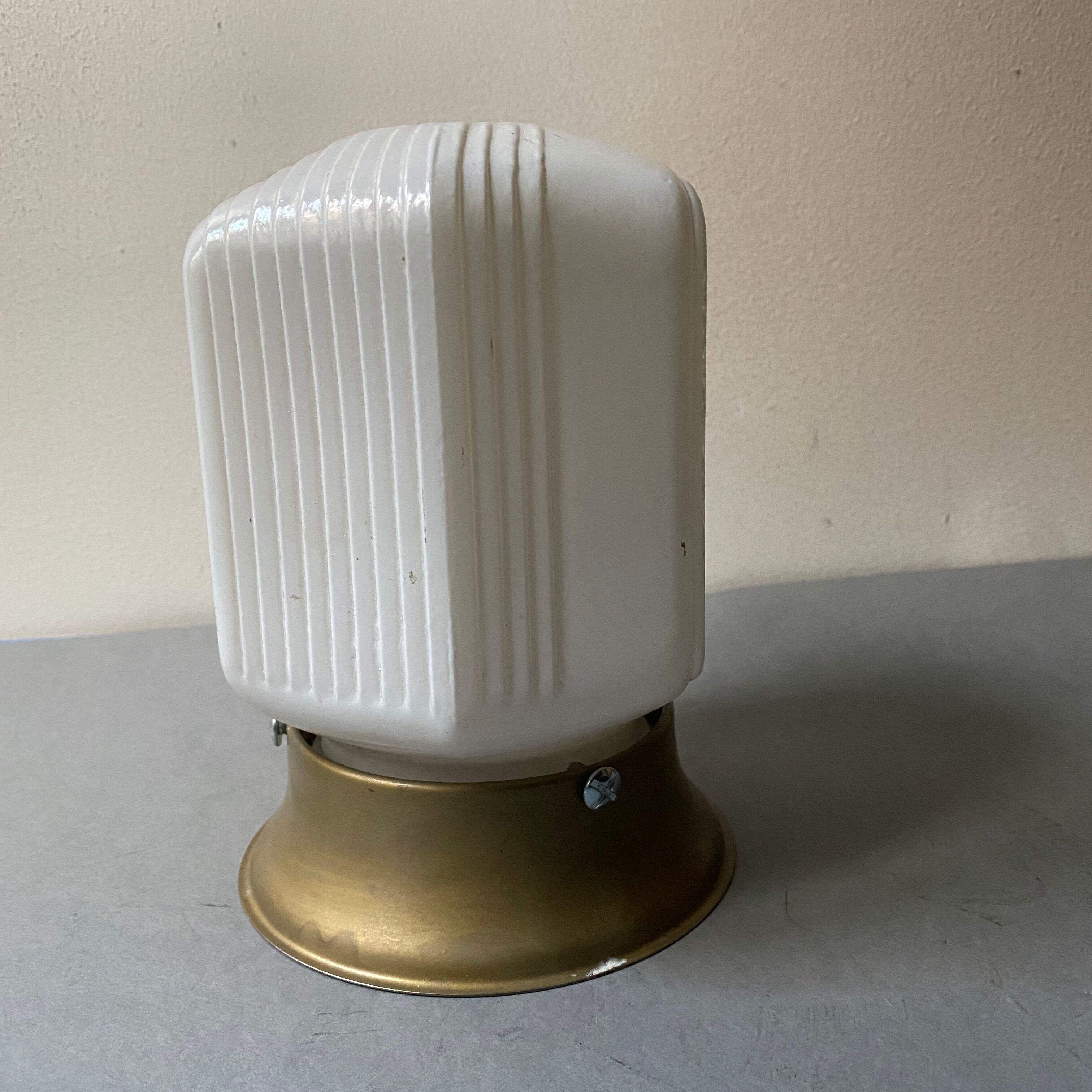 Old wall sconce in glass