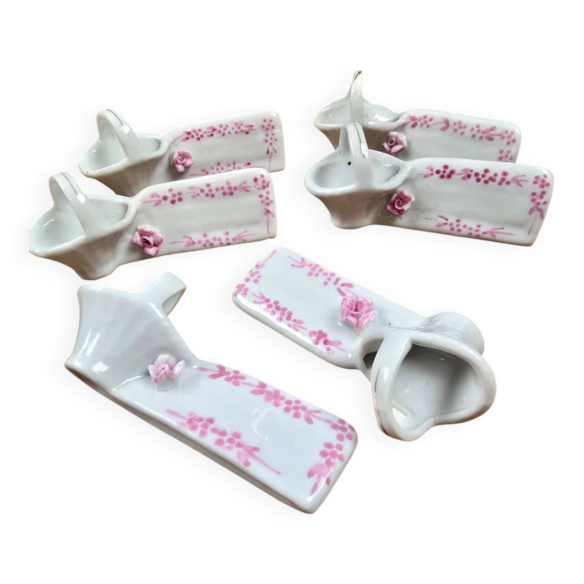 Set of 6 vintage porcelain knife rests with name markers, basket shape.