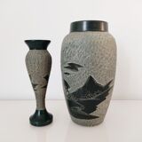 Set of two carved stone vases