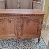 Sideboard carved in natural wood