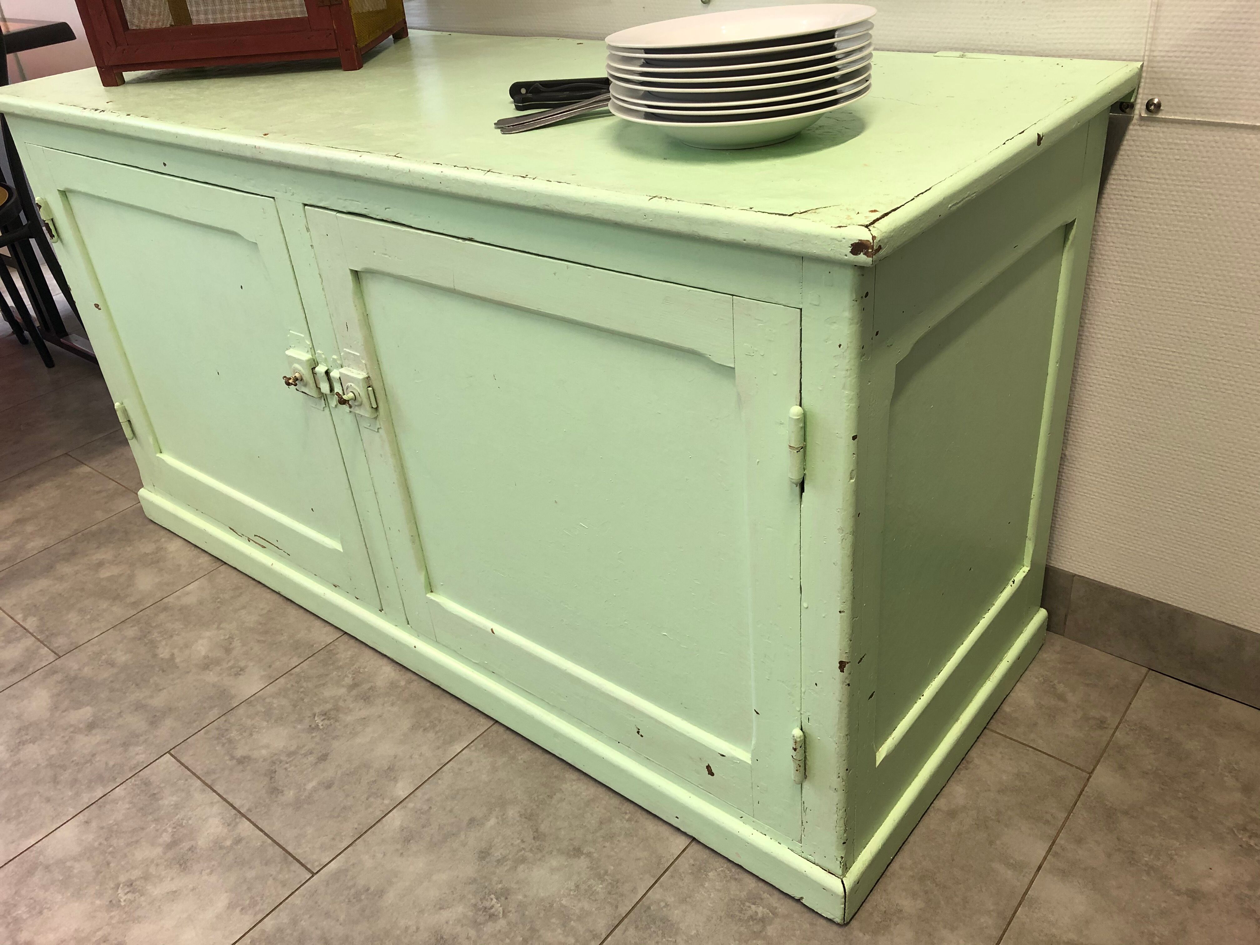 Low green patinated furniture