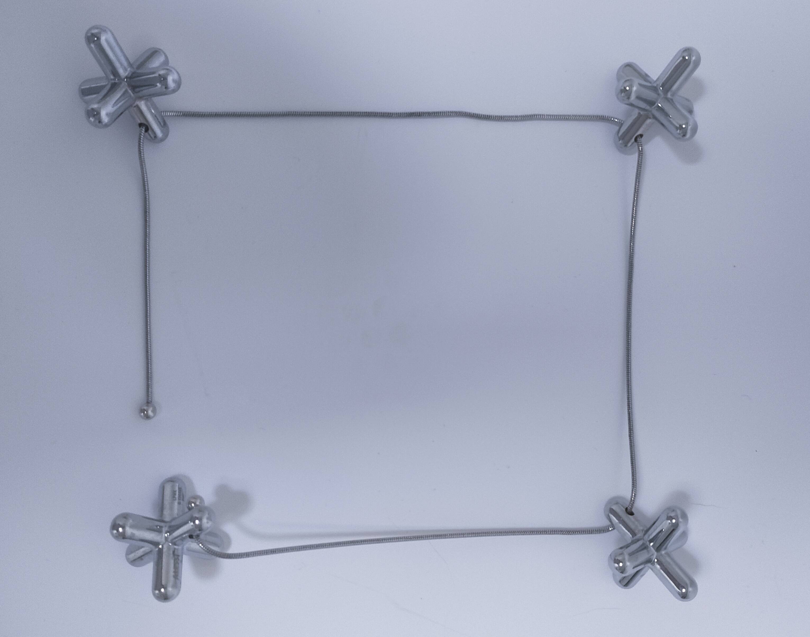 Alessi trivet design G. Chiave