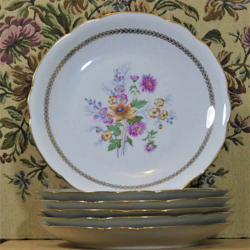 Antique porcelain table plates stamped C.N.P