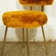 Pelfran mustard & gold moumoute chair