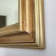 Miroir ancien en bois doré et cuivré