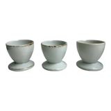 Trio of white shells bordered gold 50s