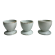 Trio of white shells bordered gold 50s