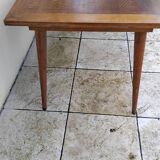 Vintage oak table with tapered legs.