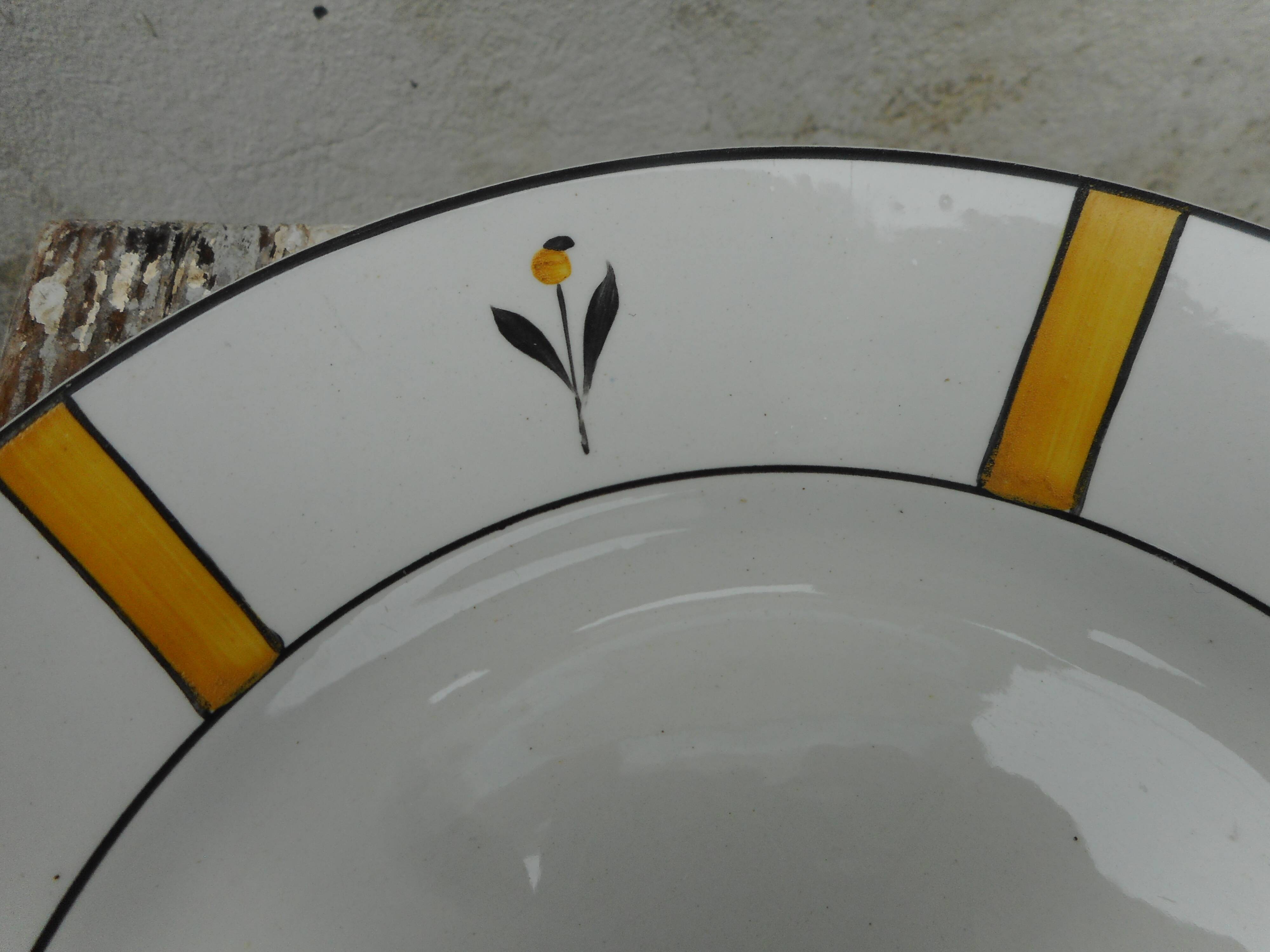 Six flat plates made of earthenware