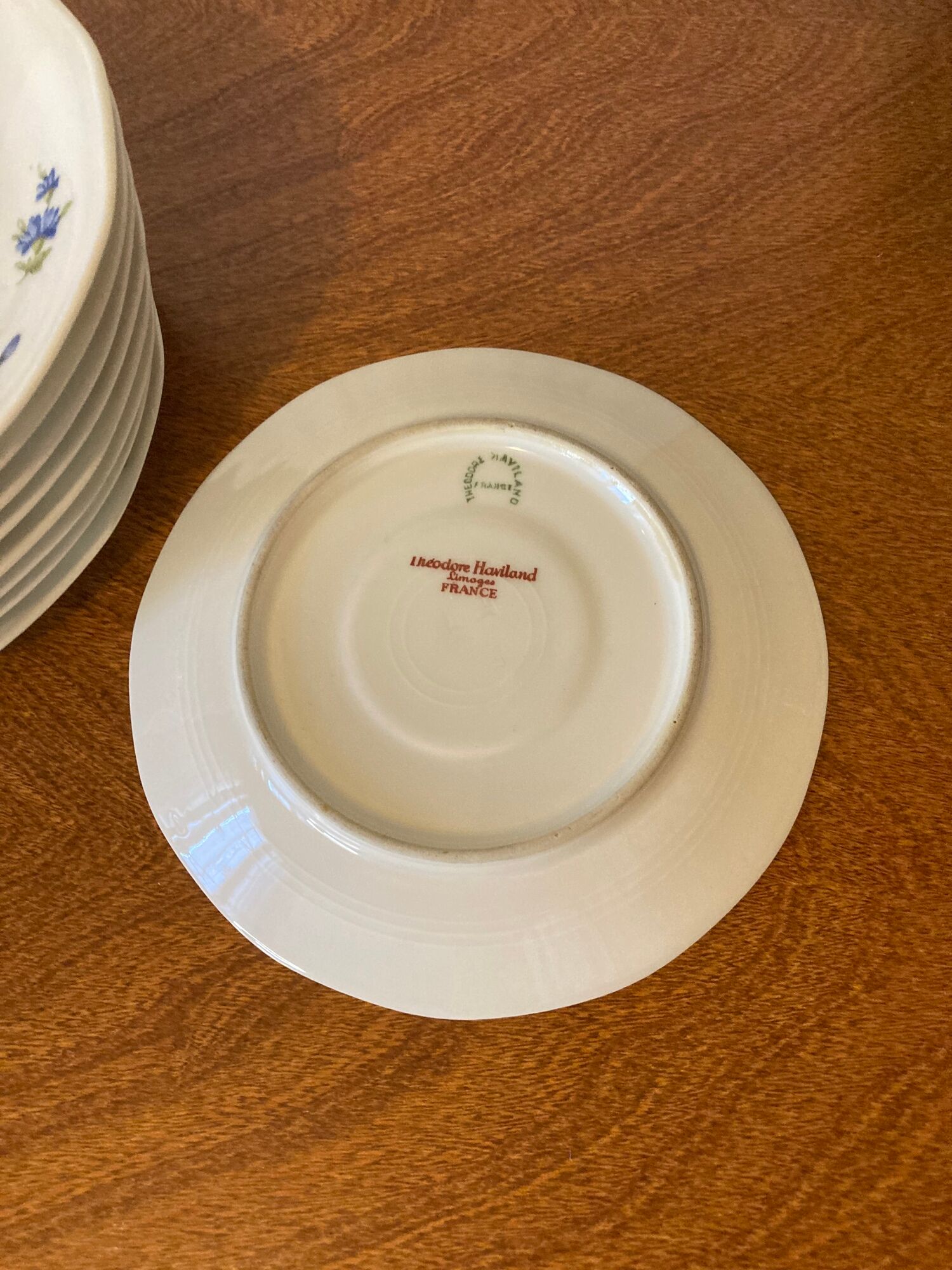 9 Limoges Haviland porcelain saucers or saucers with floral motifs.