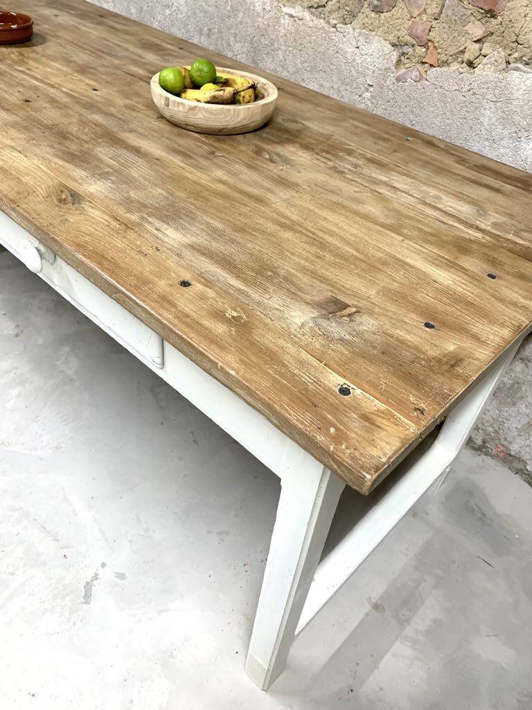 Farm table with off-white legs.
