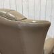 Pair of high-backed Chesterfield armchairs with 1 leather footrest