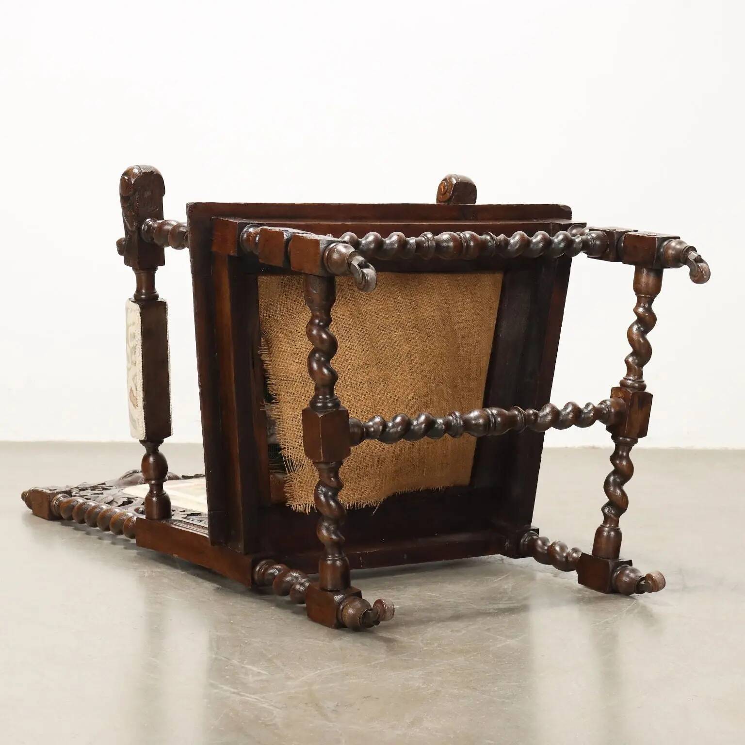 Antique Neo-Renaissance armchair in oak and fabric, 19th-20th century.