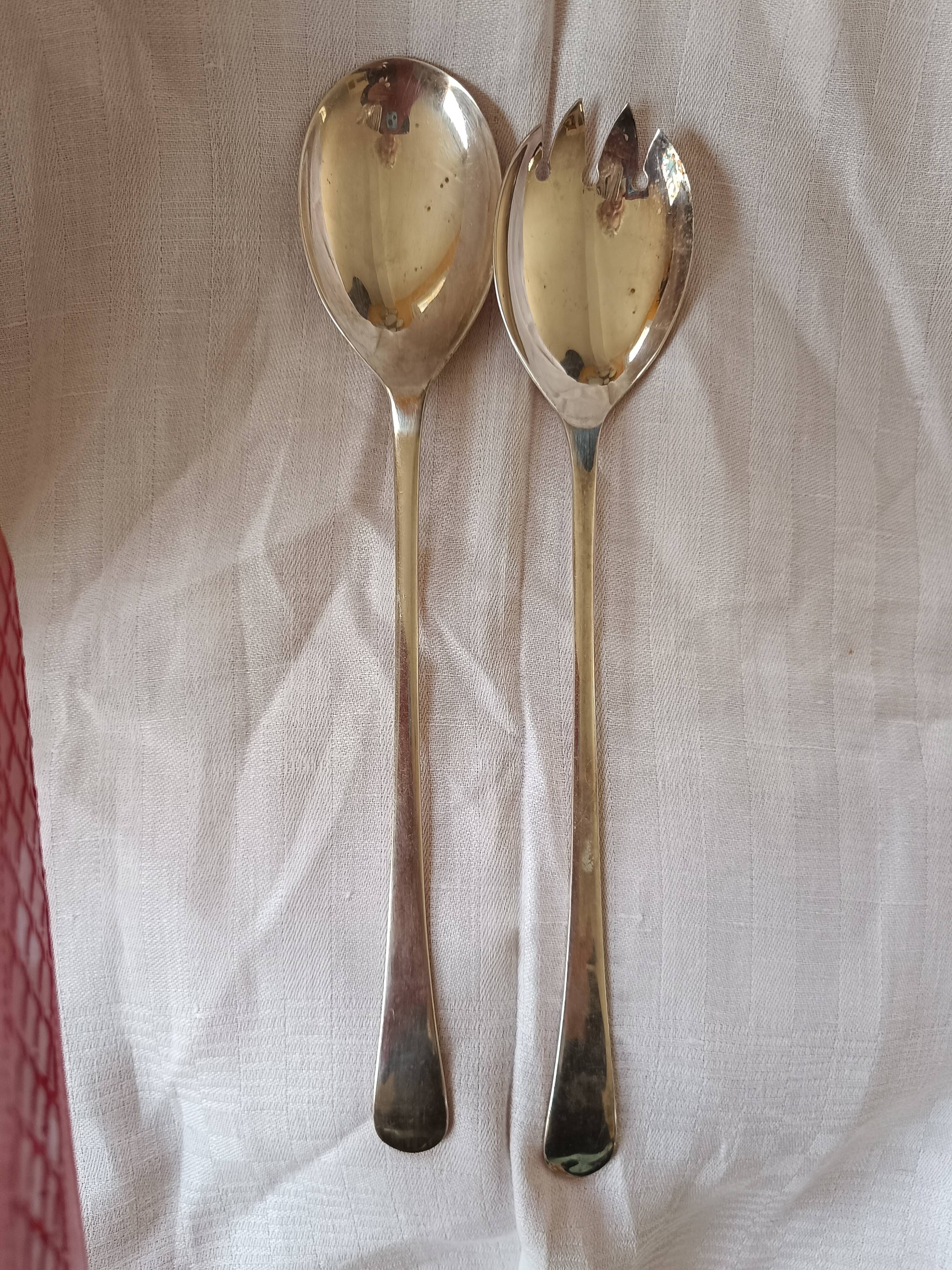 Eclassiqoe salad servers in English silver metal.