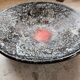 Large stoneware platter signed c. pitot, mid-20th century, black, white, and red glazed ceramic