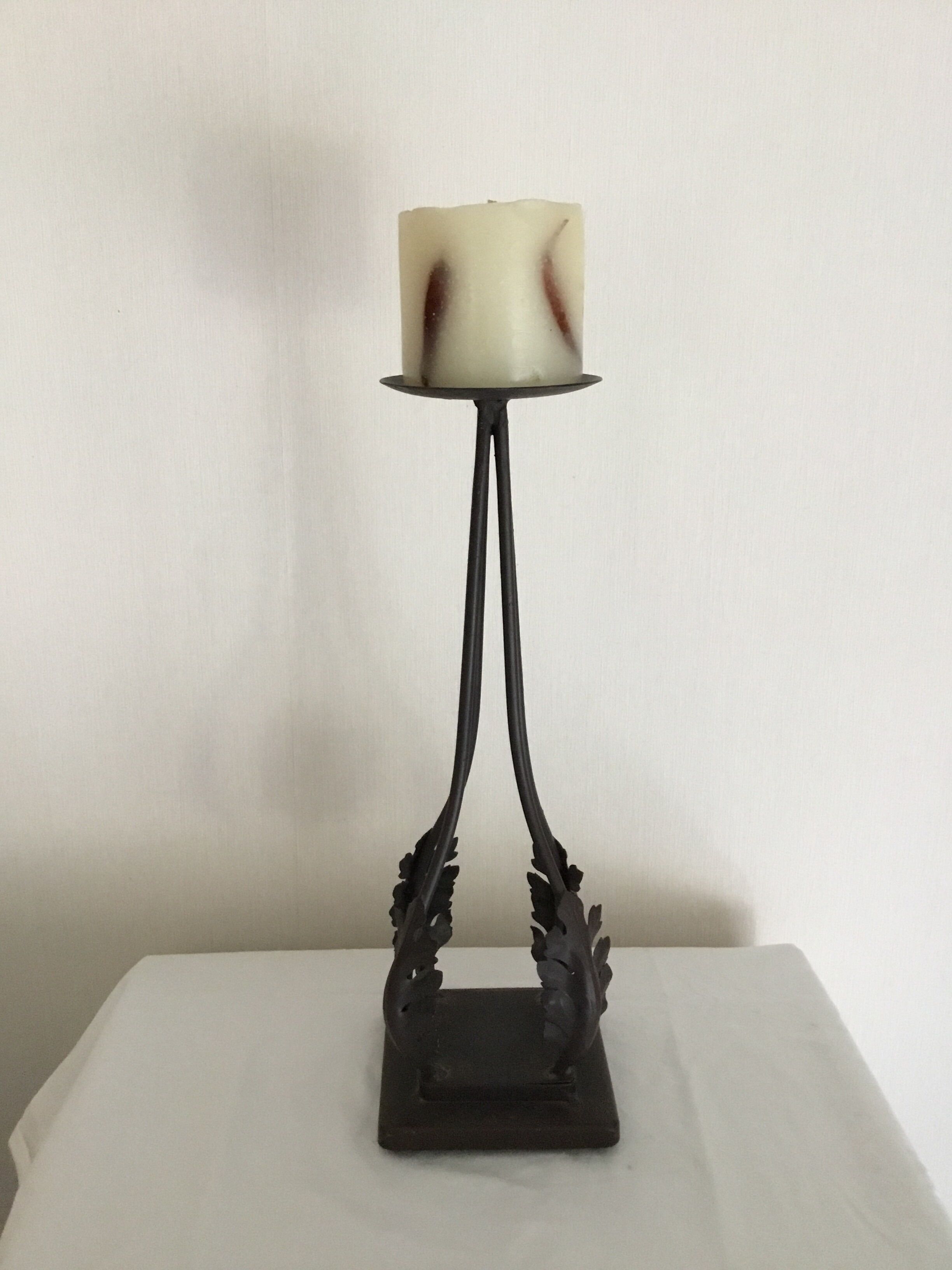 Candlestick wrought with its original candle iron