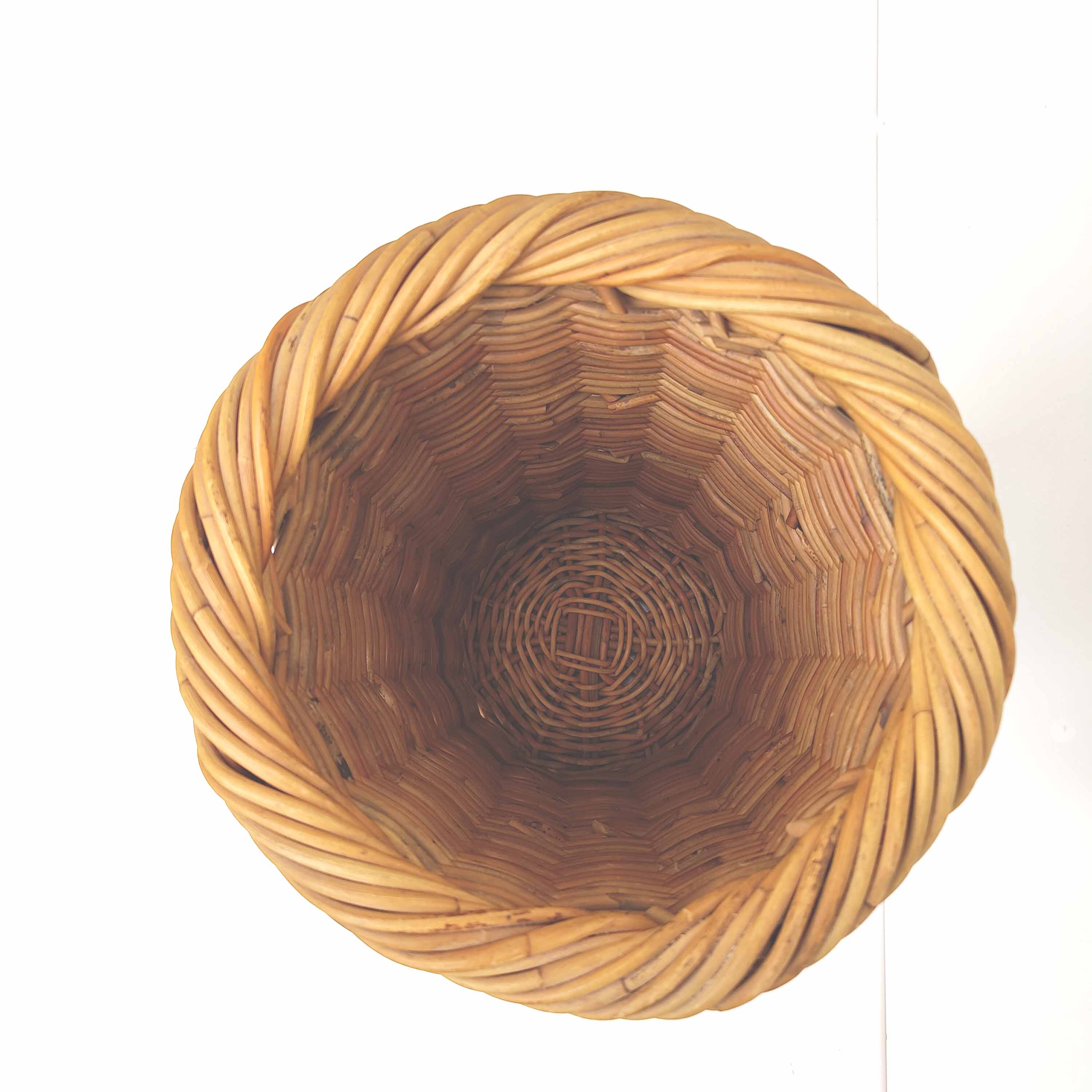 Vintage woven wicker umbrella holder