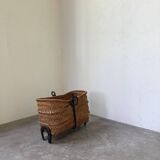 Magazine rack or log rack in straw with brutalist base from the 50s
