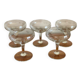 5 champagne glasses with flower decoration