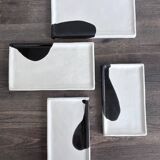 Lot of 4 rectangular glazed terracotta plates.