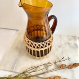 Amber glass and wicker carafe
