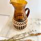 Carafe verre ambré et osier