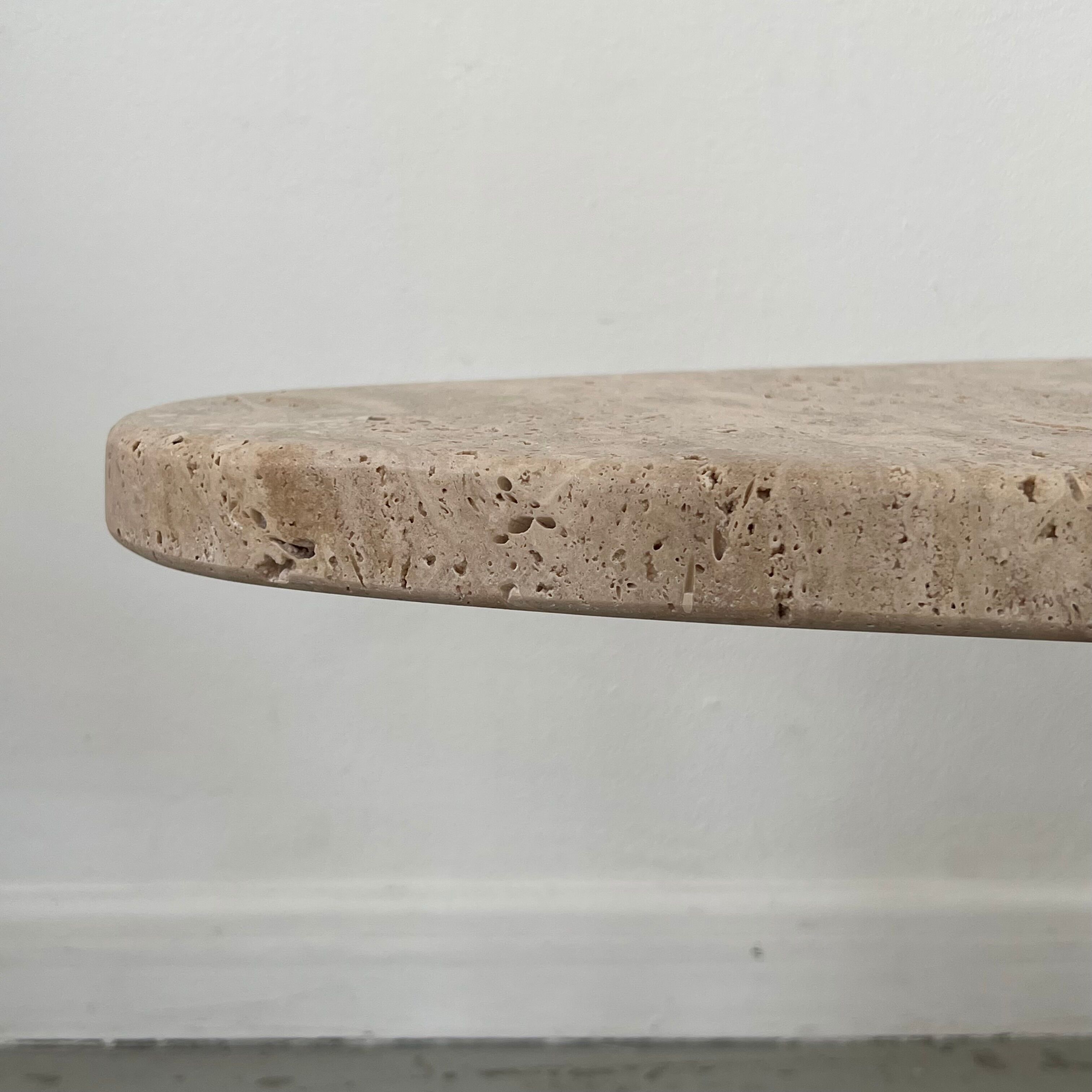 Oval travertine coffee table