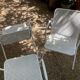 Perforated metal armchairs