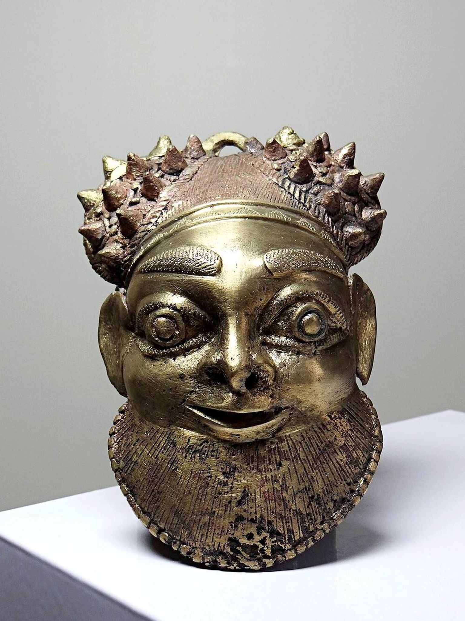 Small gilded bronze Oba mask from Bamoun, Cameroon, vintage Africa